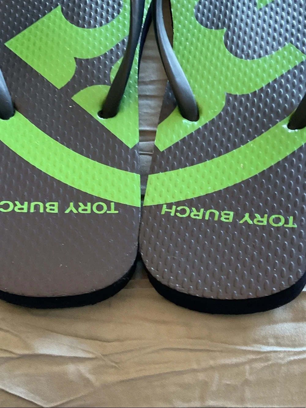 Tory Burch Navy Flip Flops with Lime Green Logo Accent